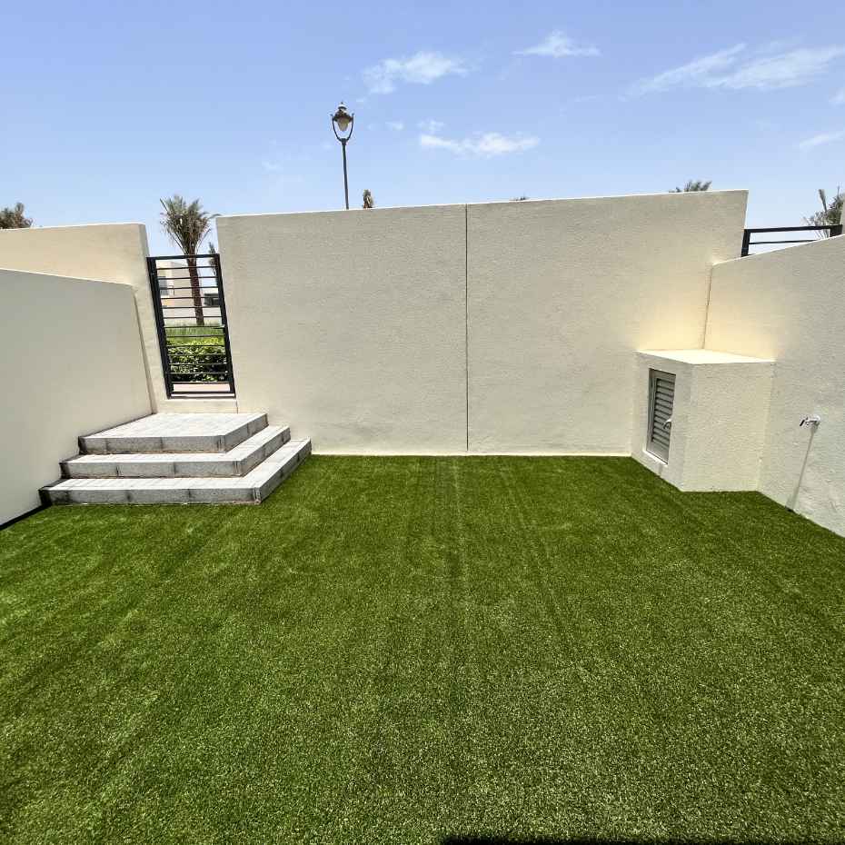 Outdoor Area Completely Covered With Fake Grass For A Natural Look