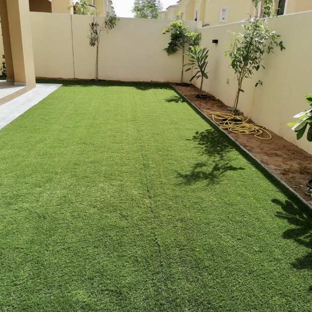 Outdoor Space Decorated With 1021 Tropical Artificial Grass By Elixir Grass In Dubai, UAE