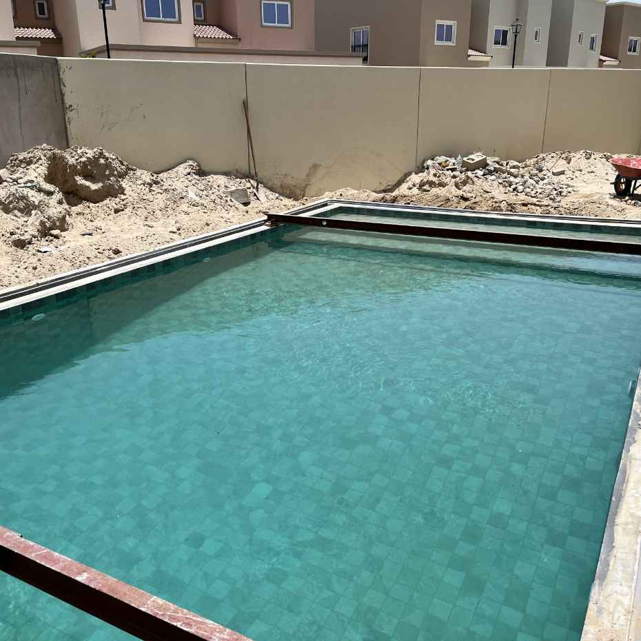The Swimming Pool Constructed with Alpine Green 100x100 Mosaic Pool Tiles is in the Final Stage