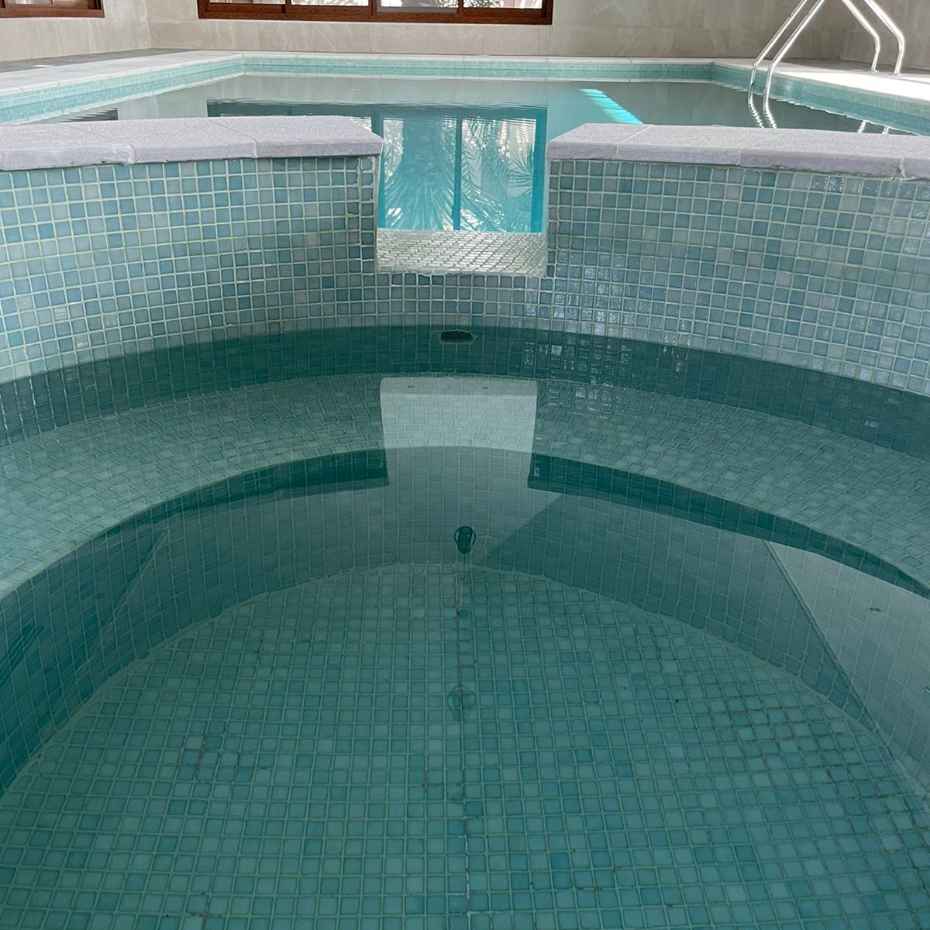 acuzzi Pool With EGM-201 Light Green Glass Mosaic Tiles.