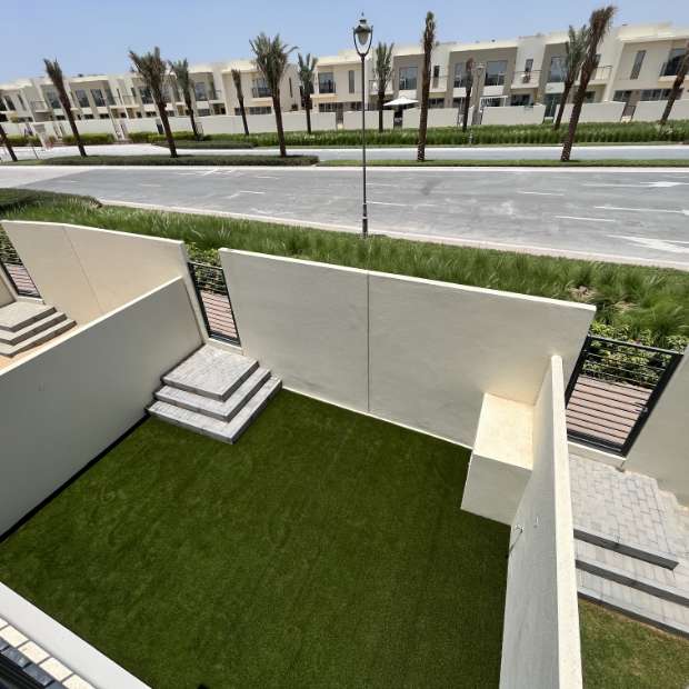 Partitioned Roadside Outdoor Area With Artificial Grass In Dubai, UAE