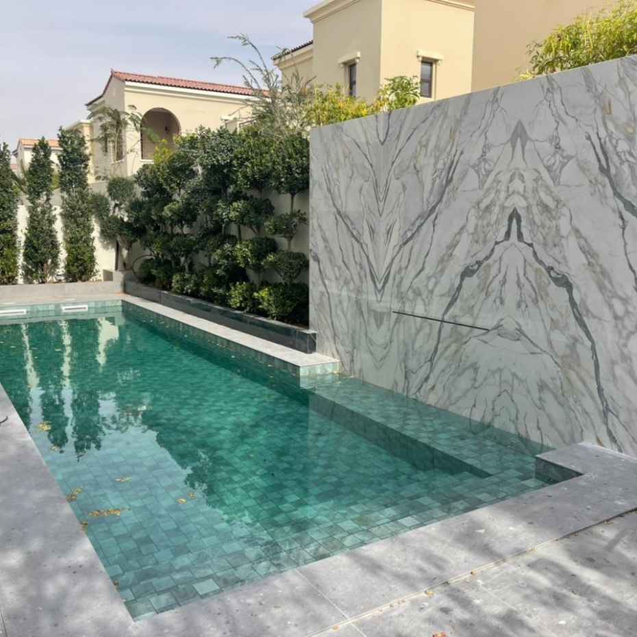 A beautiful little pool made by Using Alpine Green 100 x 100 Mosaic Swimming Pool Tile