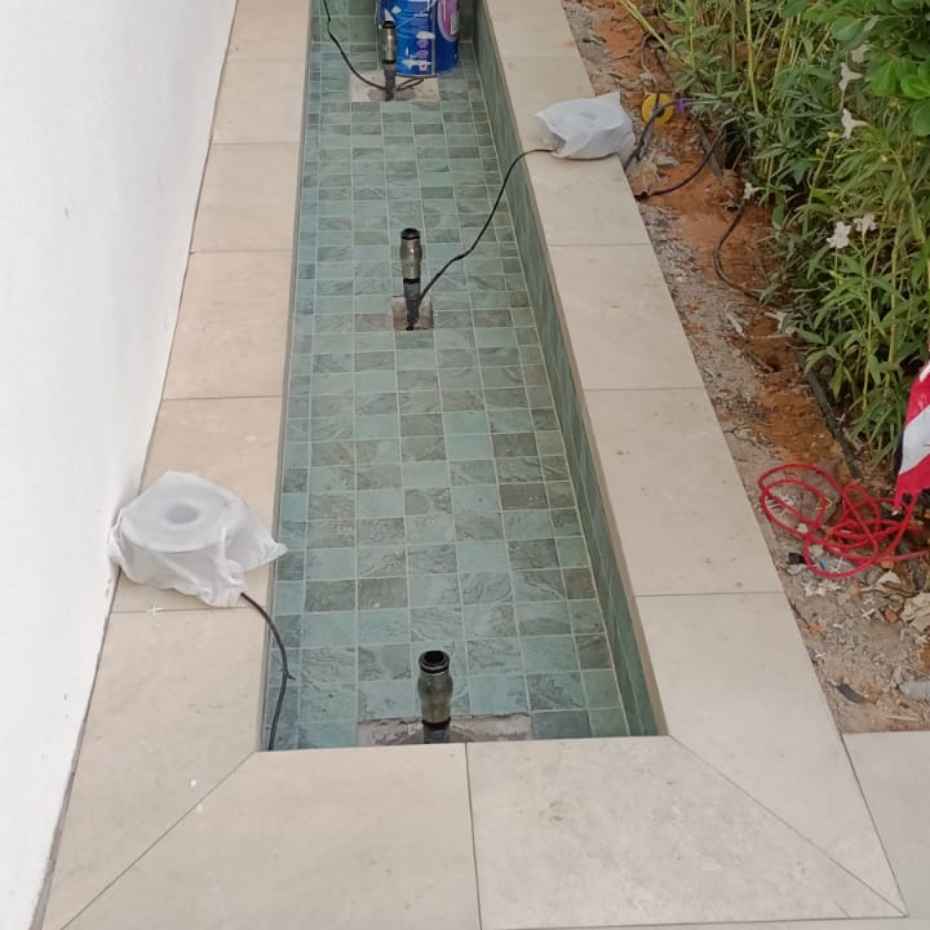 Plunge Pool Enhanced by Alpine Green 100x100 Mosaic Pool Tile for a Beautiful Garden Look
