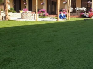 Elixir Synthetic grass installed outdoors at a villa.