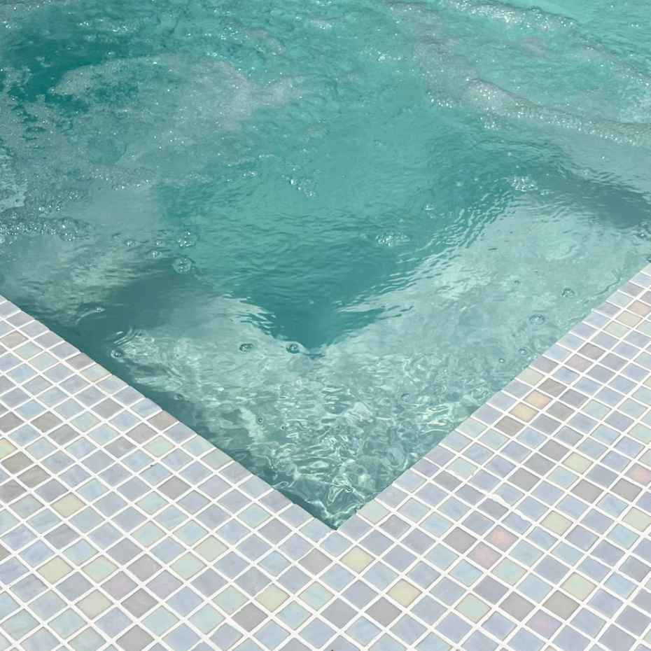 Swimming Pool With EGM-Pearl 500 Mosaic Pool Tiles, Enhancing Its Beauty And Elegance.
