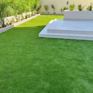 Patio with artificial grass installed in Dubai