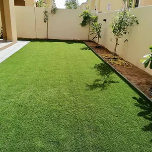 Back side of house with artificial grass installed in Dubai