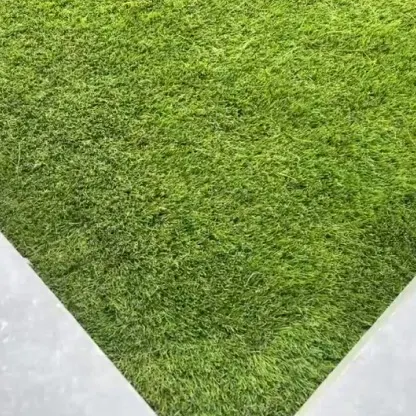 Close-up view of dense turf texture with realistic grass blades of premium artificial grass in UAE